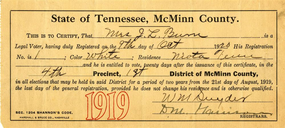 | Tennessee Wesleyan University A 1919 McMinn County, Tennessee voter registration certificate with handwritten name and address, a large red '1919' stamp, and the seal of the registration authority at the bottom.