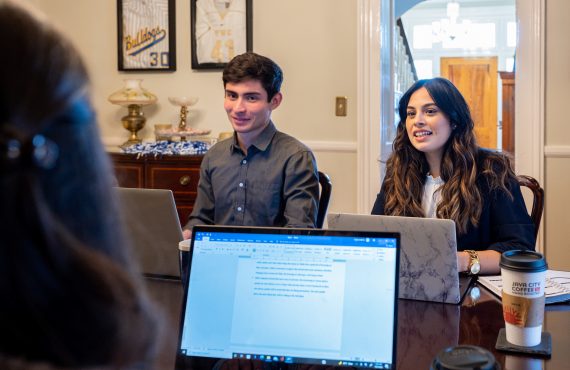 Two students meeting in Blakeslee Hall