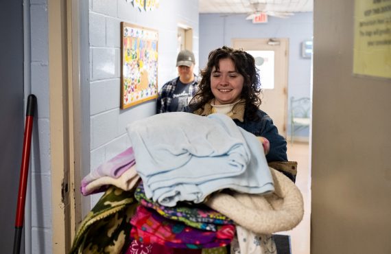 Student donating during day of service